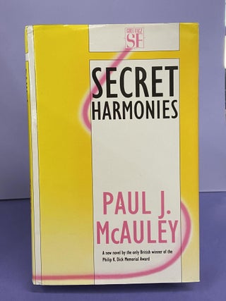 Item #68517 Secret Harmonies. Paul J. McAuley
