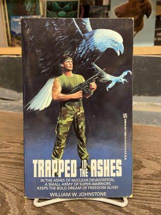 Item #71950 Trapped in the Ashes. William W. Johnstone