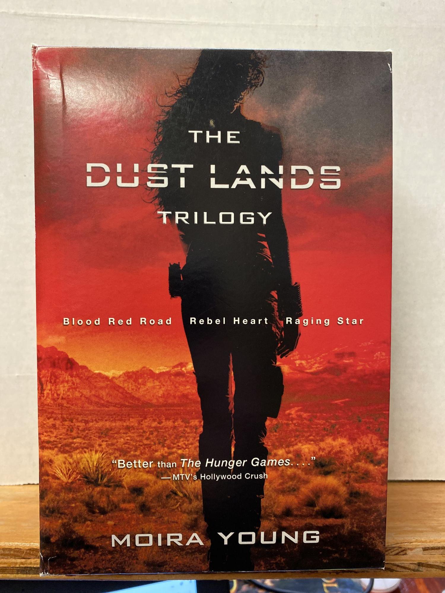 The Dust Lands Trilogy: Blood Red Road; Rebel Heart; Raging Star by Moira  Young on Chamblin Bookmine