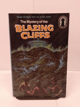 Item #79374 The Mystery of the Blazing Cliffs. Mary V. Carey