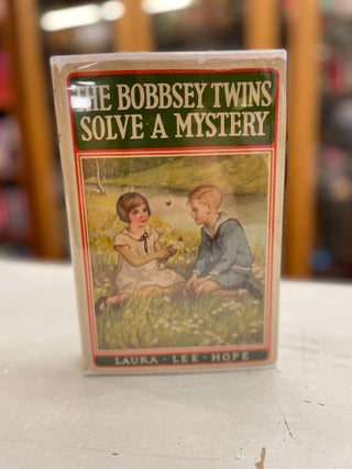 Item #82275 The Bobbey Twins Solve a Mystery. Laura Lee Hope