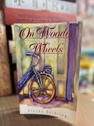 Item #82927 On Wooden Wheels. Stacey Goldring