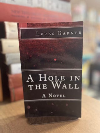 Item #83130 A Hole in the Wall. Luca Garner