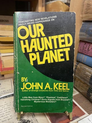 Item #85616 Our Haunted Planet. John A. Keel