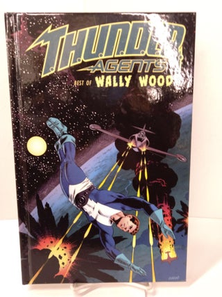 Item #89227 T.H.U.N.D.E.R. Agents: The Best of Wally Wood. Michael Uslan