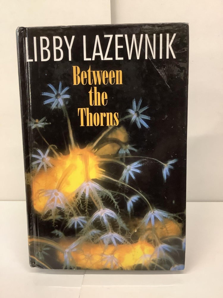 Item #92231 Between the Thorns. Libby Lazewnik.